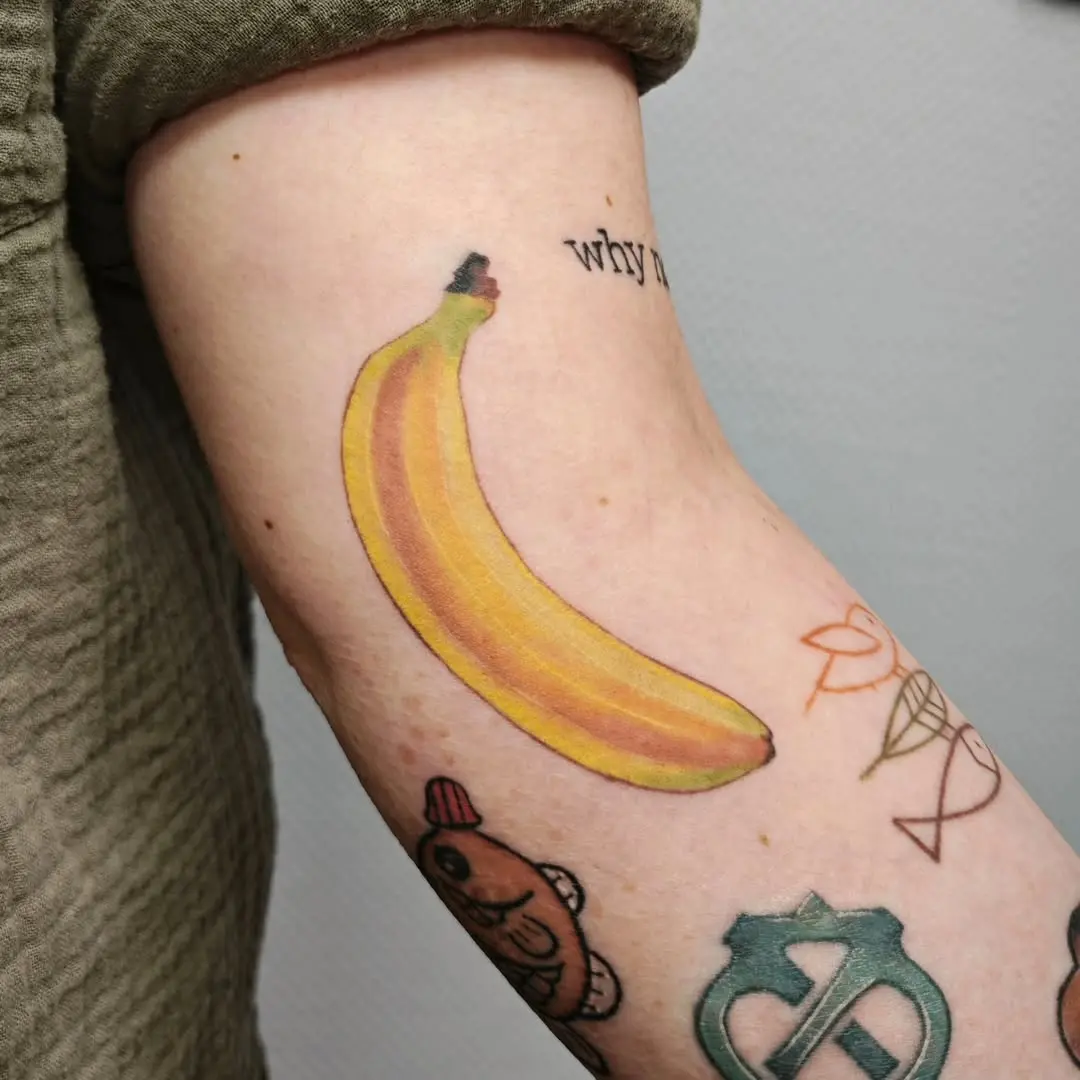 Vivid banana tattoo for playful vibes