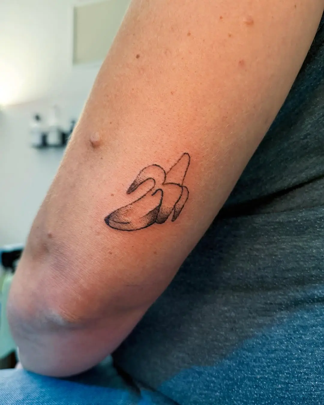 Stylish and simple banana tattoo design