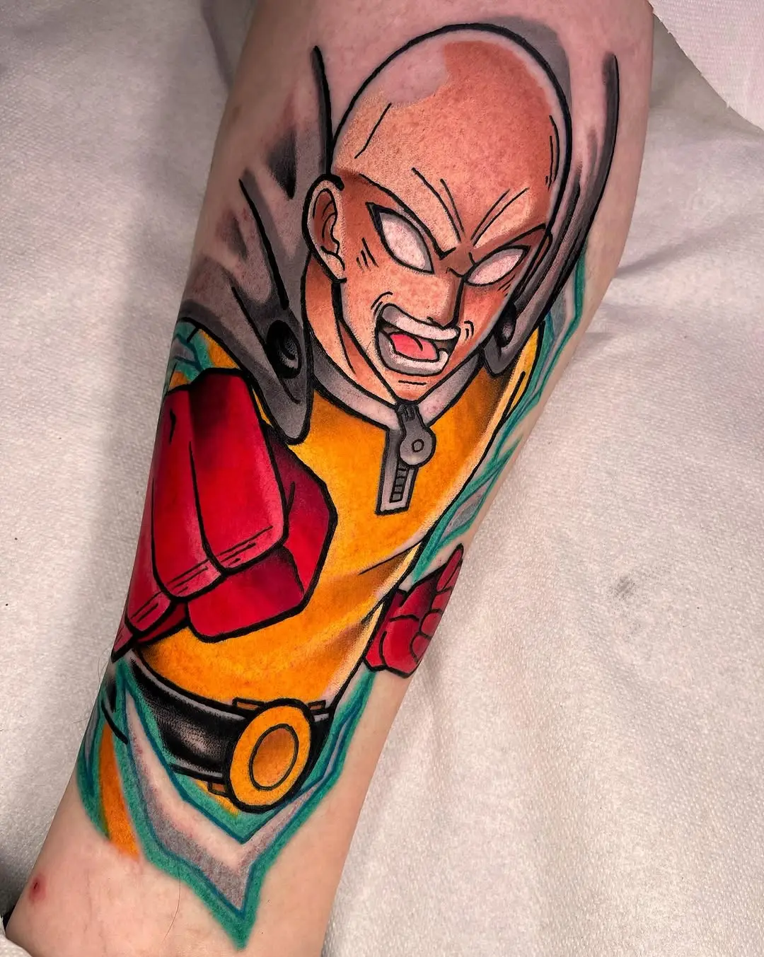 Dynamic One Punch Man tattoo in vibrant colors
