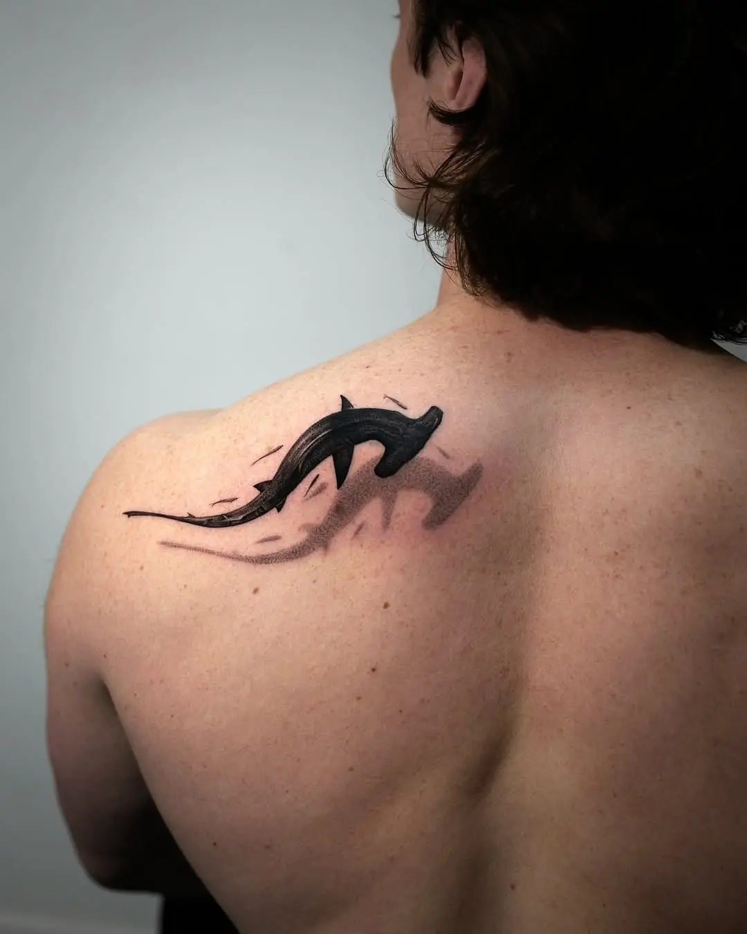 Dynamic shark tattoo with 3D effect