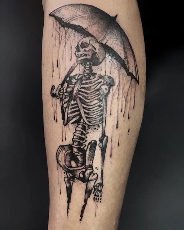Unique skeleton umbrella tattoo design for art lovers