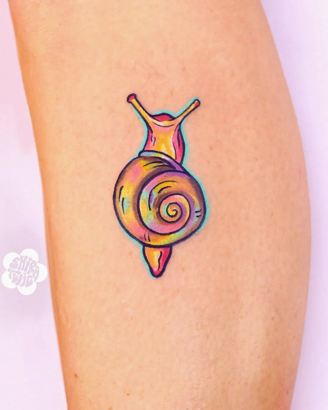 Vibrant snail tattoo with beautiful color gradients