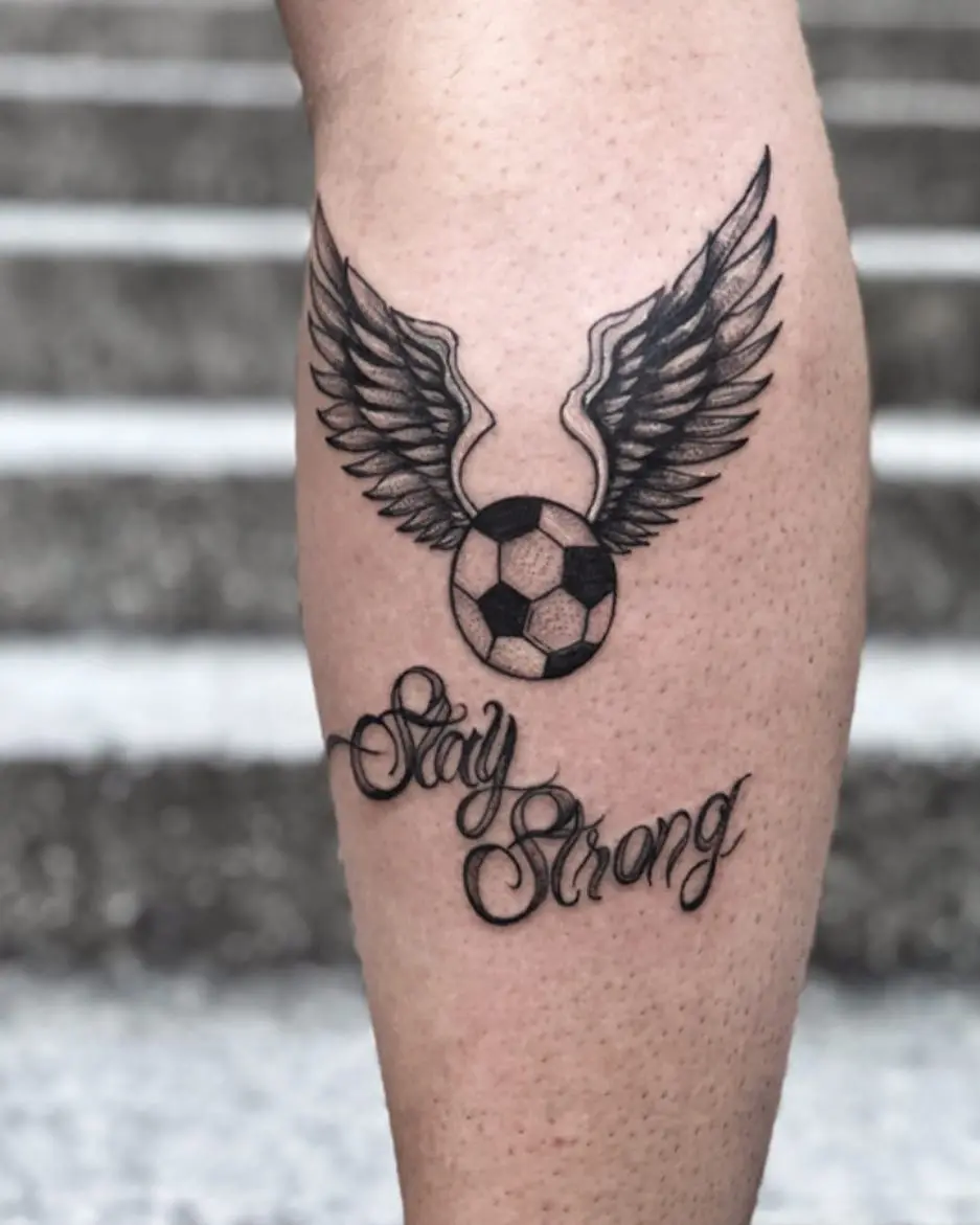 Inspirational soccer tattoo featuring wings