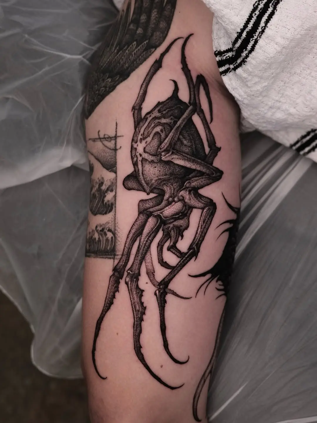Intricate black ink spider tattoo design