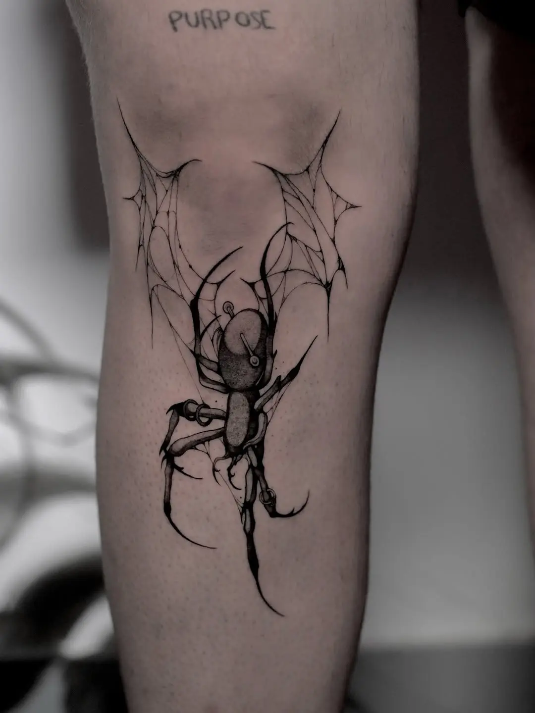 Intricate Spider Tattoo with Web Elements