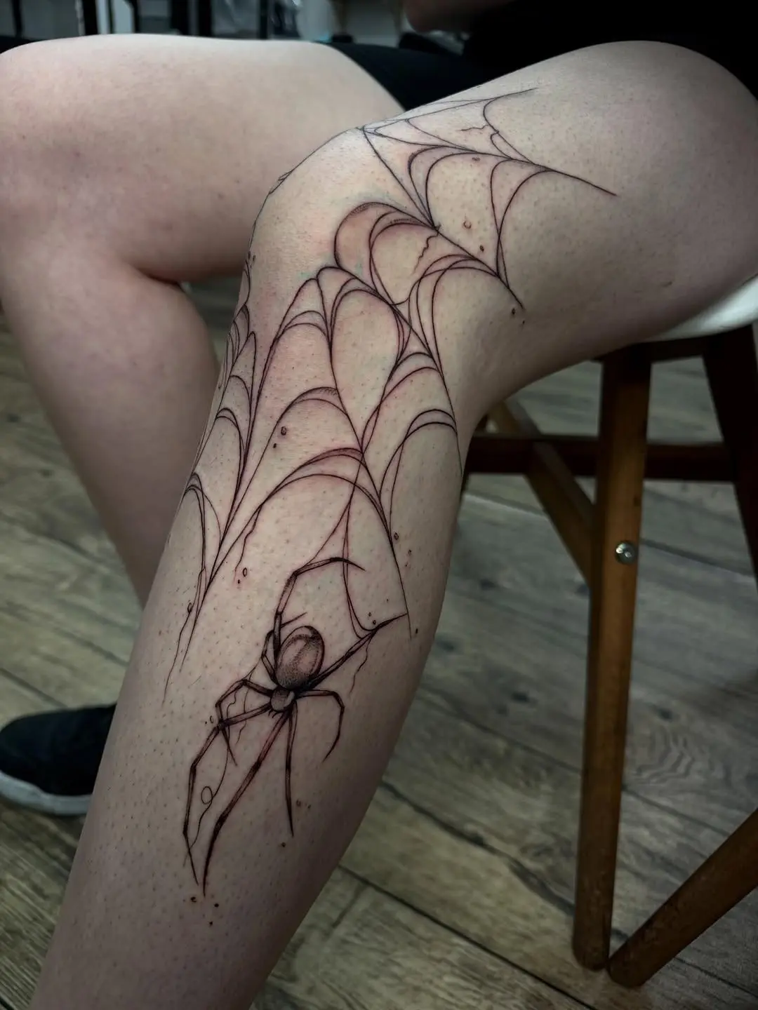 Intricate Spider and Web Tattoo Design