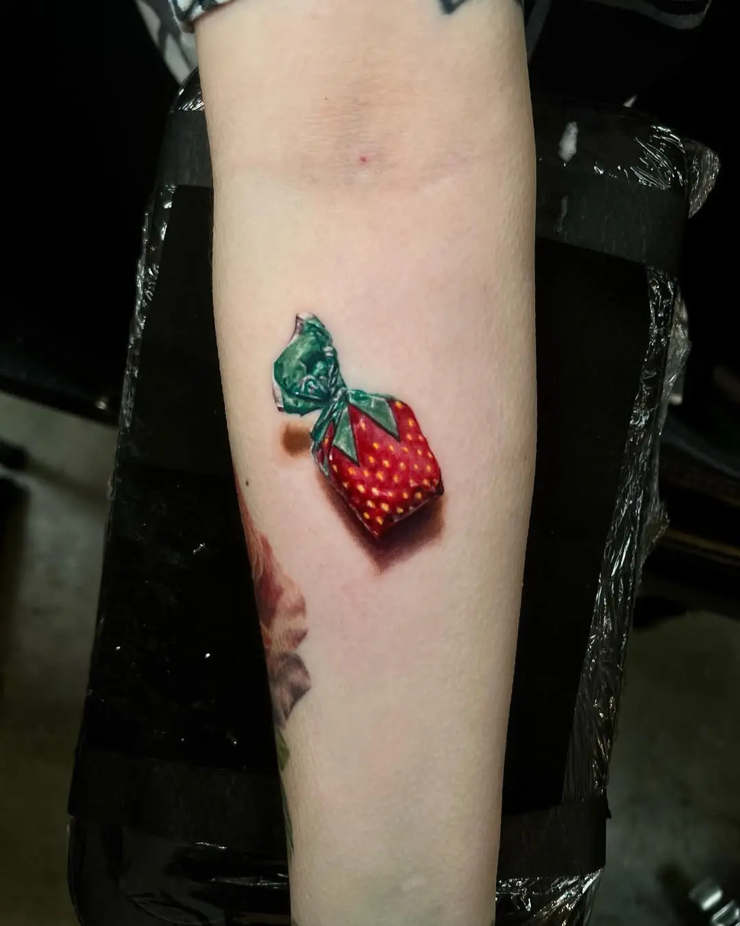 Whimsical 3D Strawberry Gift Tattoo