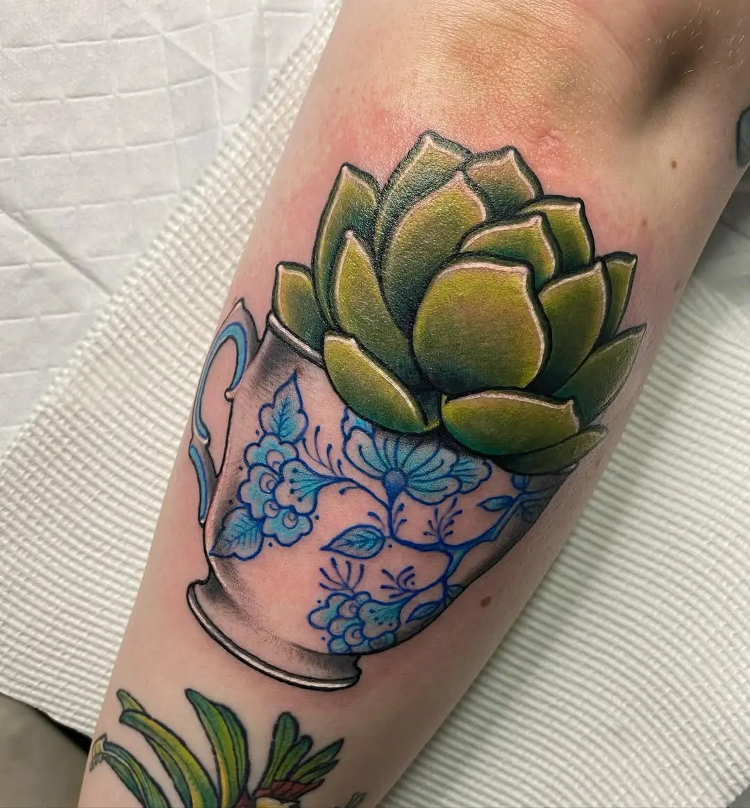 Charming succulent in a teacup tattoo