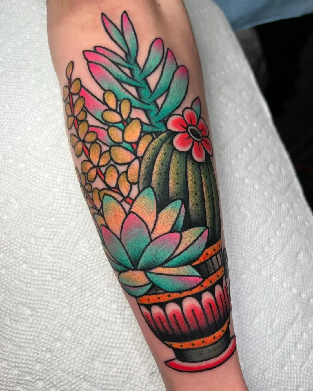 Vibrant Succulent Tattoo with Artistic Details