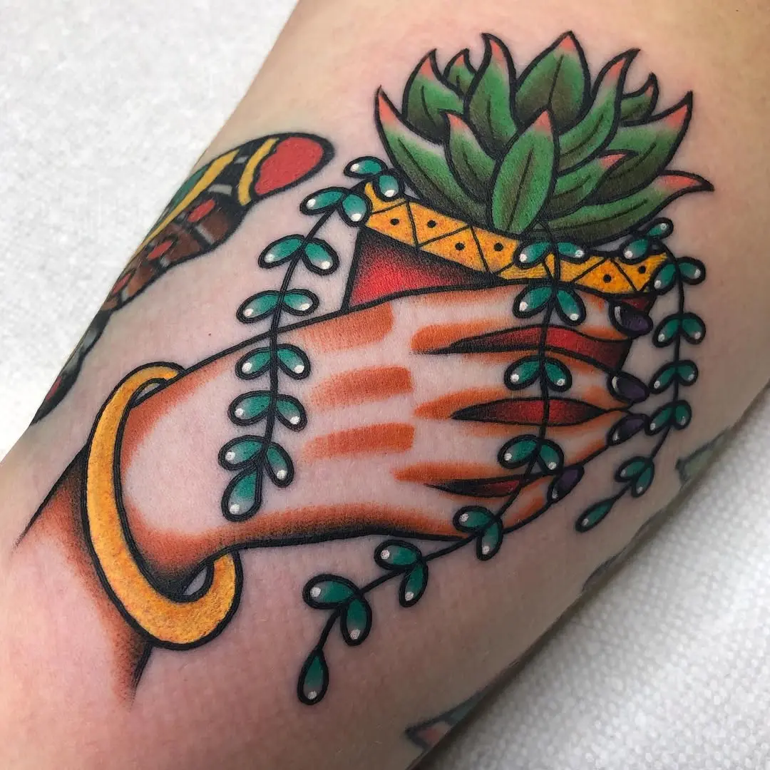 Bold succulent tattoo with vibrant colors
