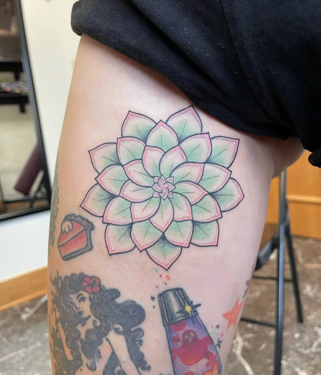 Stunning succulent tattoo on the thigh