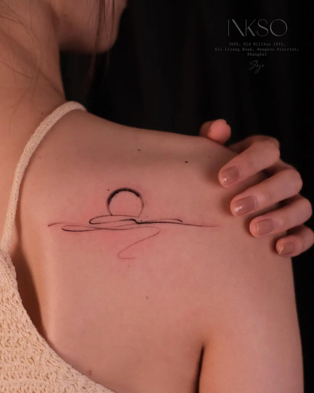 Minimalist Sunrise Tattoo on Shoulder