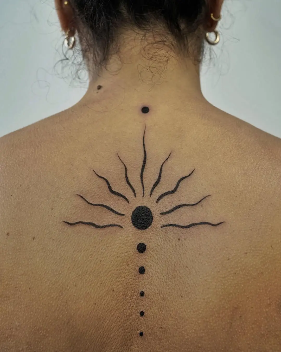 Stunning Sunrise Tattoo on Bare Skin