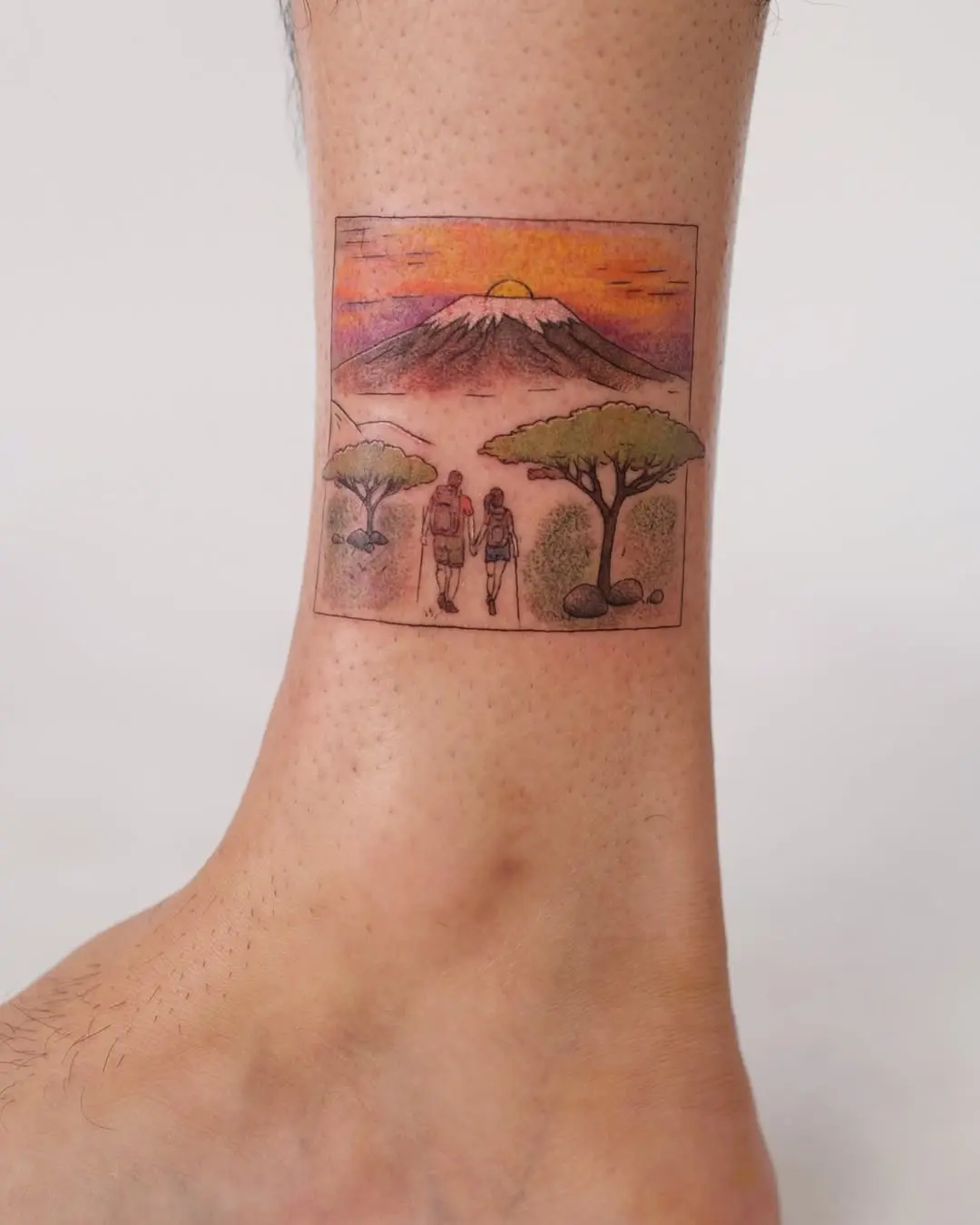 A serene sunrise hike tattoo design