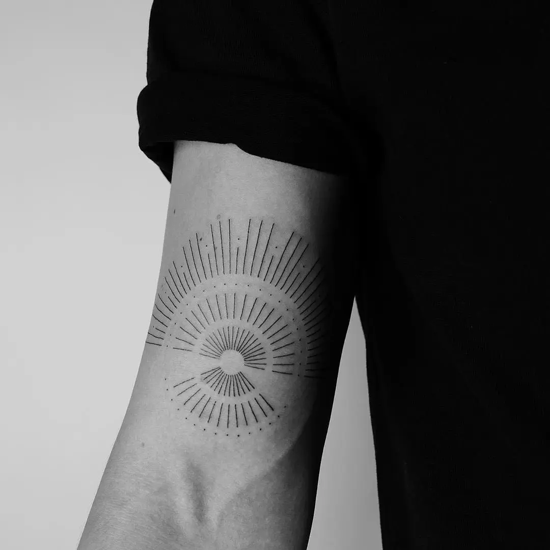 Minimalist Sunrise Tattoo on the Arm