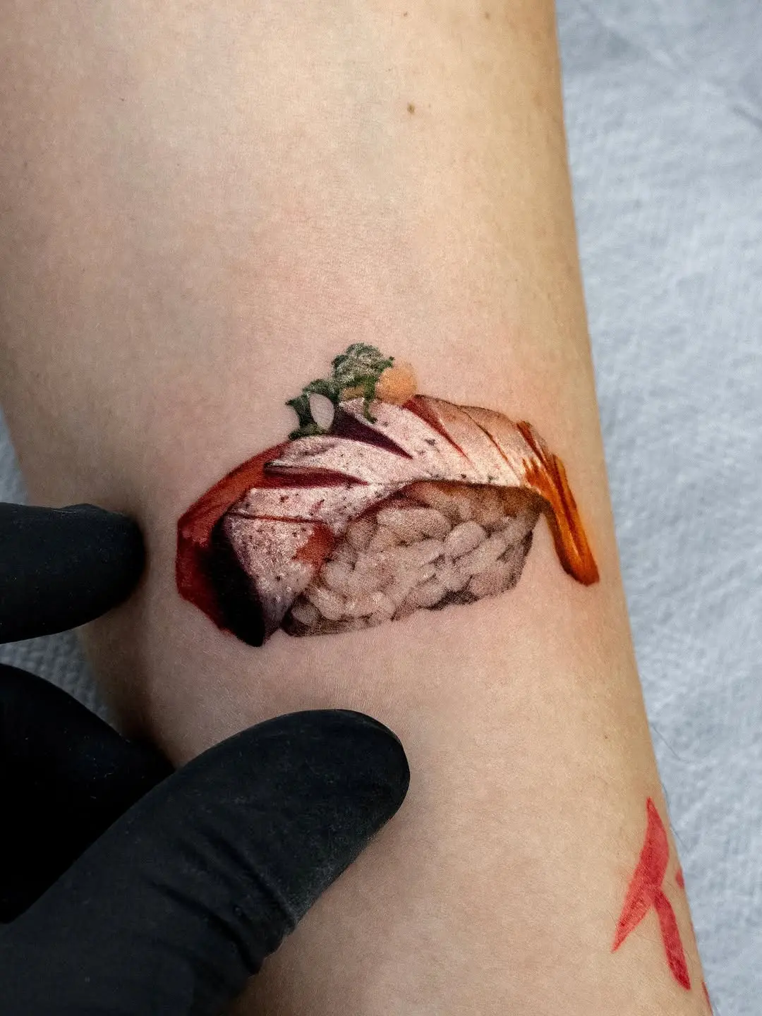 Stunning sushi tattoo bringing realism to life