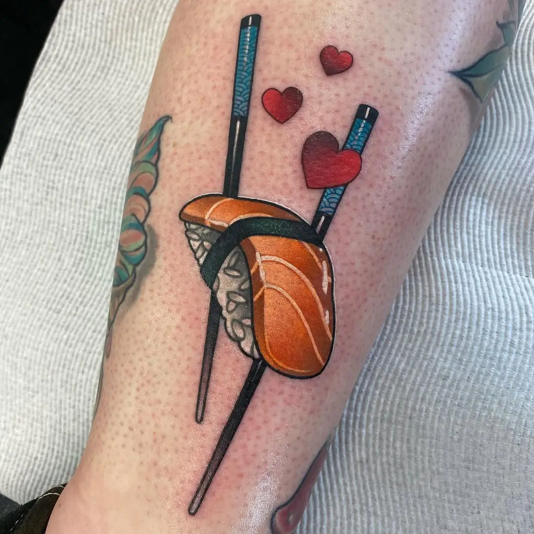 Vibrant sushi tattoo with love elements