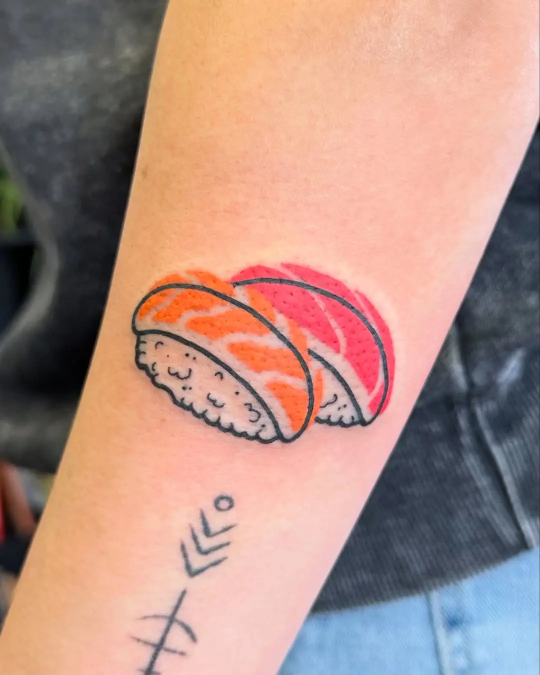 Deliciously vibrant sushi tattoo design
