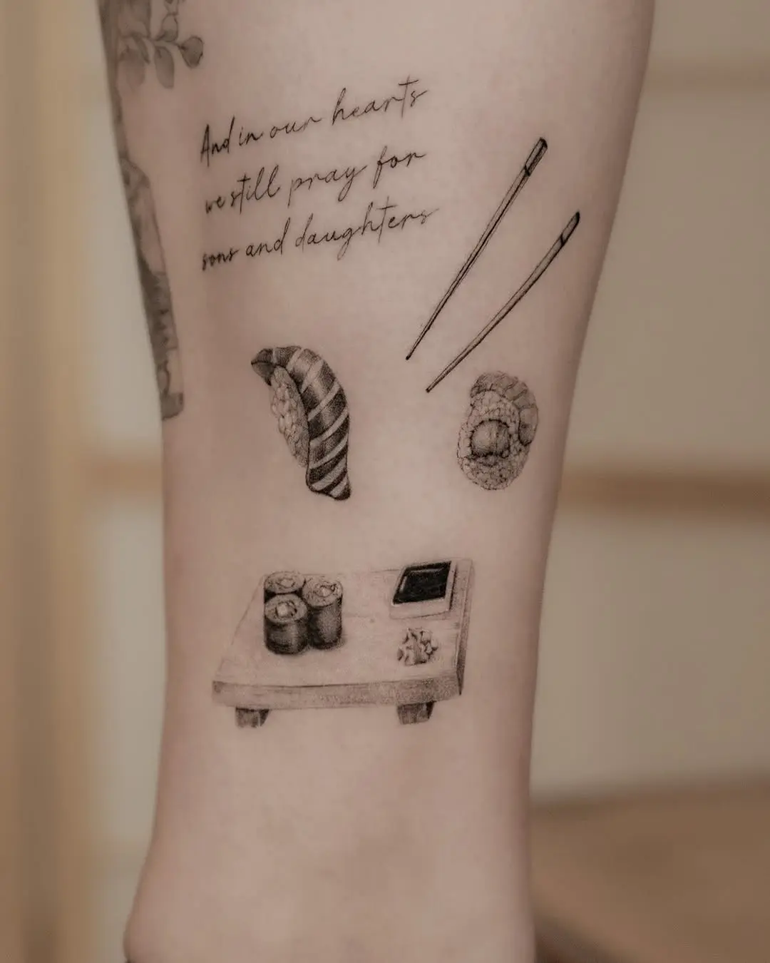 Stylish sushi tattoo with meaningful text