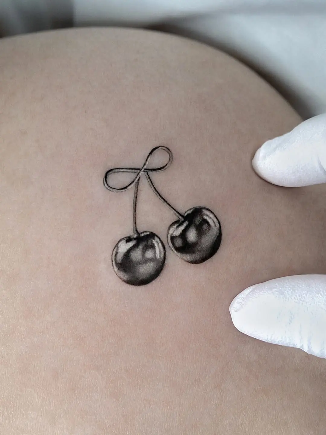 Delicate 3D Cherry Tattoo on Skin