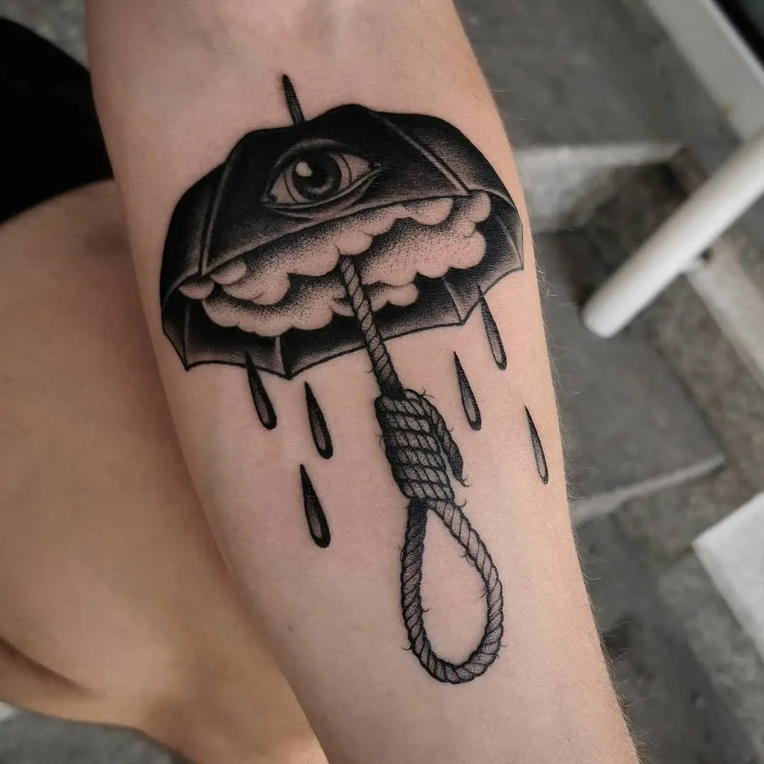 Unique umbrella tattoo with eye and rope design