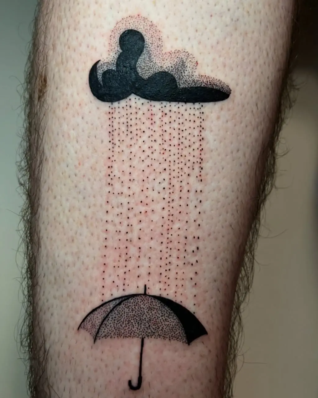 Stylish umbrella tattoo under a rainy cloud