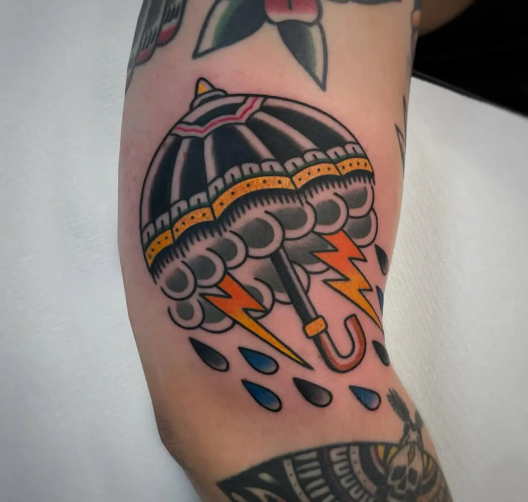Colorful umbrella tattoo with lightning and rain