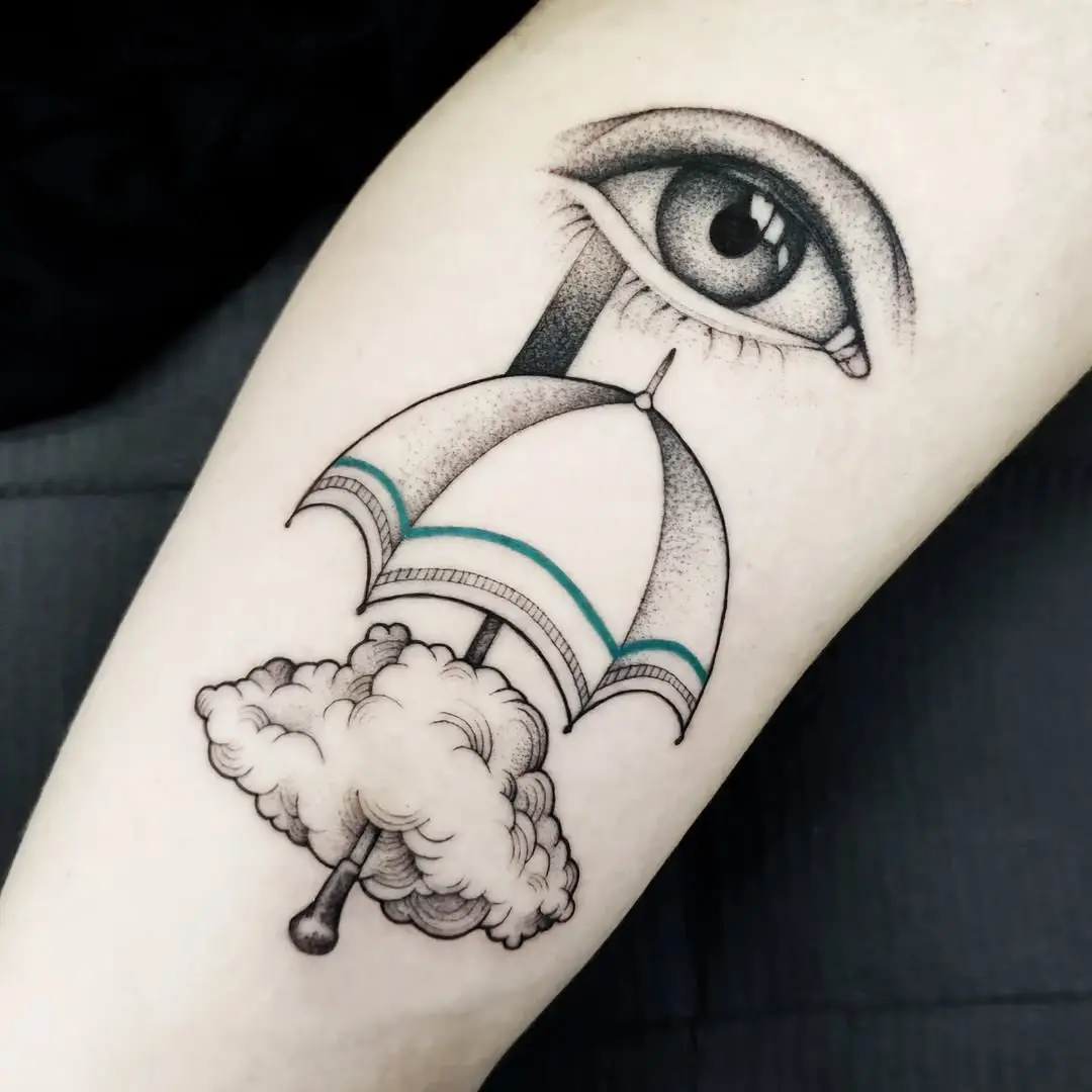 Unique umbrella tattoo blending nature and vision