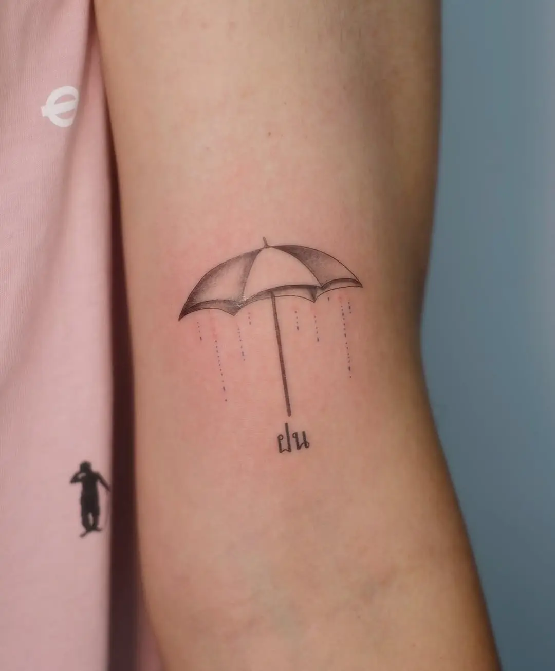 Minimalist Umbrella Tattoo with Raindrops