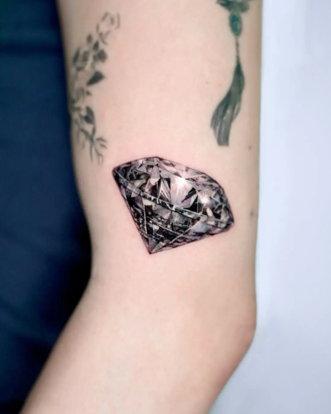 Stunning realistic diamond tattoo design on arm