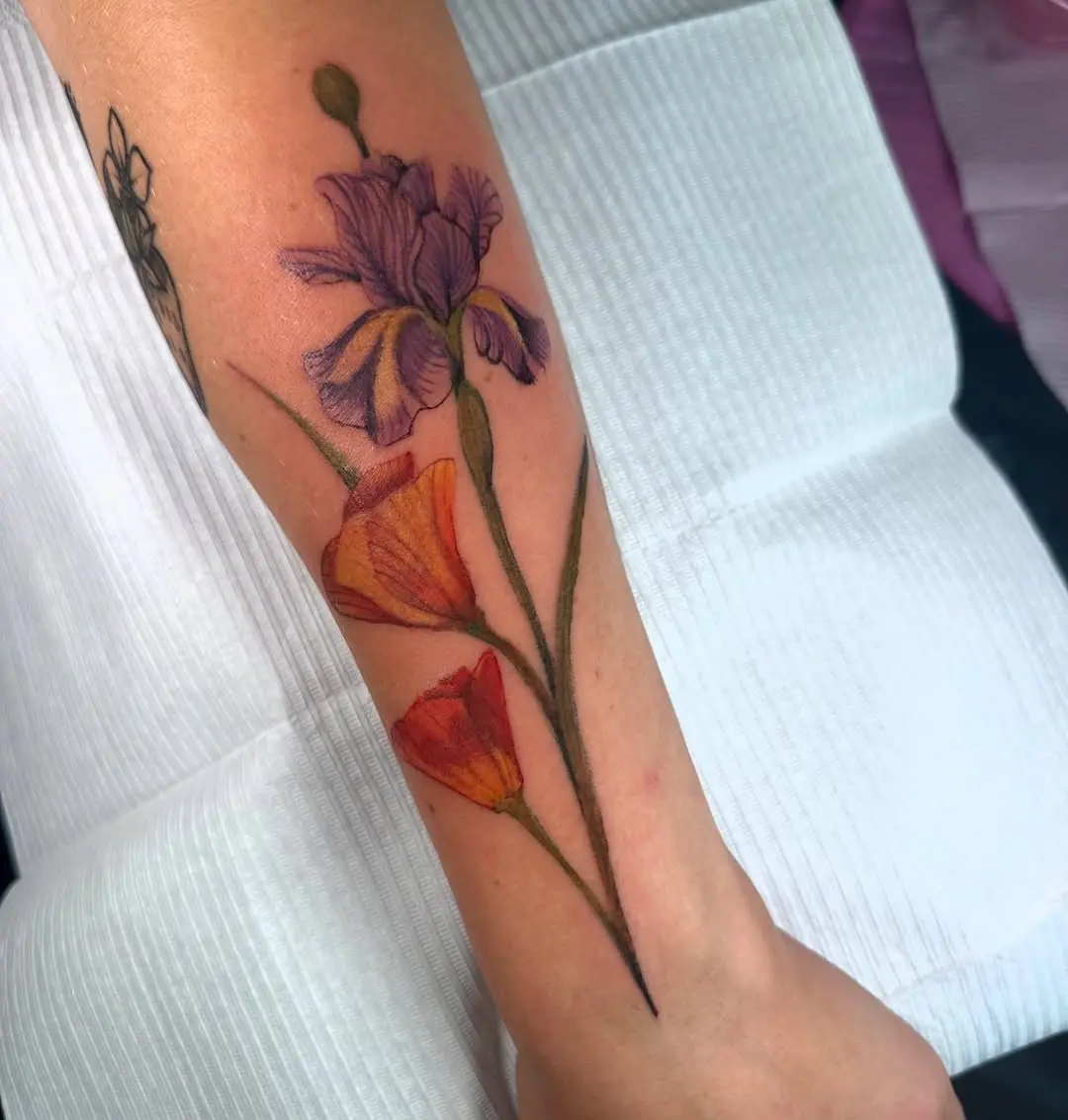 Stunning floral iris tattoo on the arm