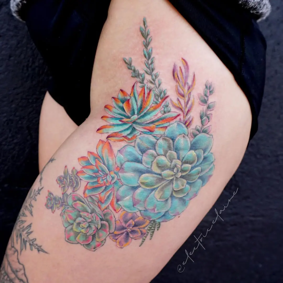 Vibrant succulent tattoo showcasing colorful flora