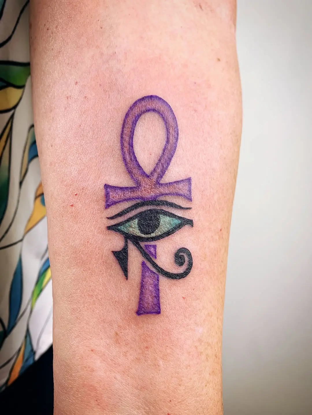 Vibrant Ankh Tattoo with Eye Detail