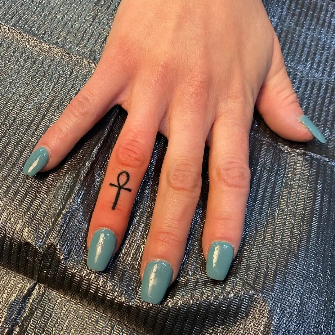 Stylish Ankh Tattoo on Hand Finger