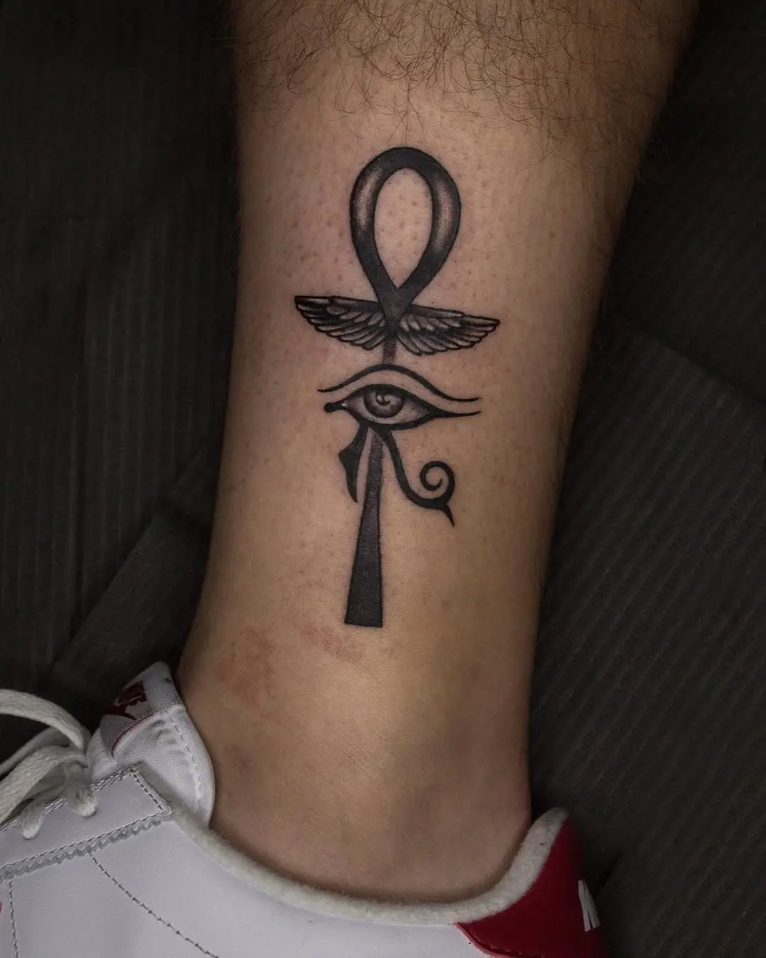Symbolic ankh tattoo with Eye of Horus