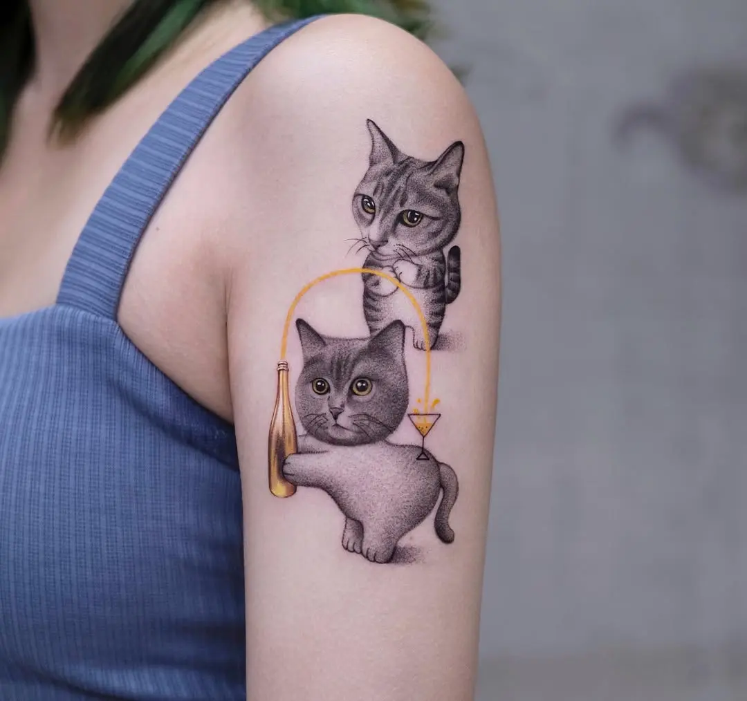 Creative cats celebrate with champagne tattoos