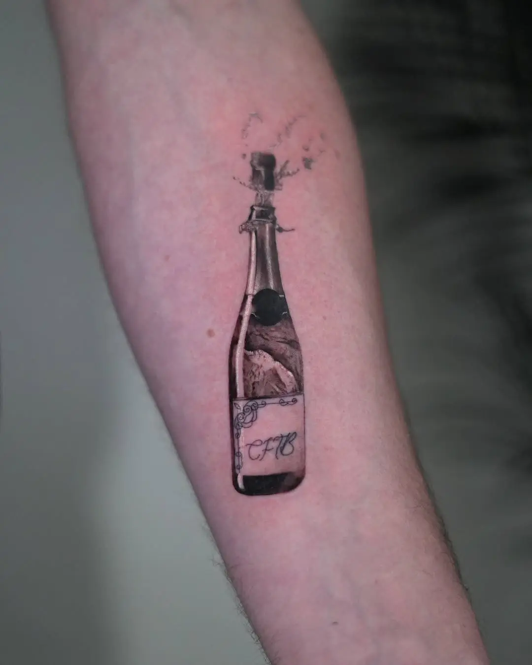 Elegant champagne tattoo with frosty vibes