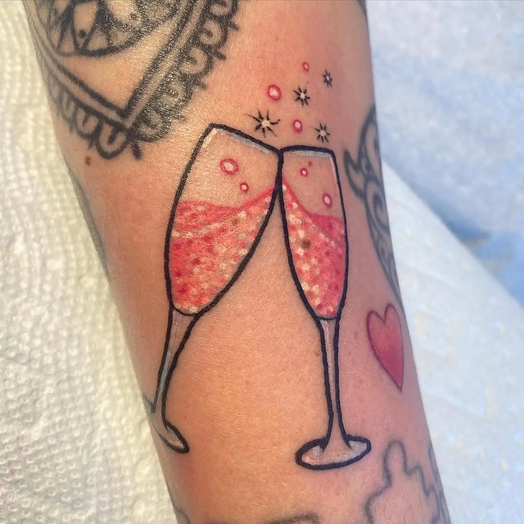 Celebratory champagne glasses with sparkles