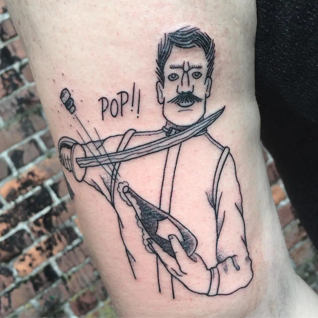 Dynamic champagne sabering tattoo with vintage flair