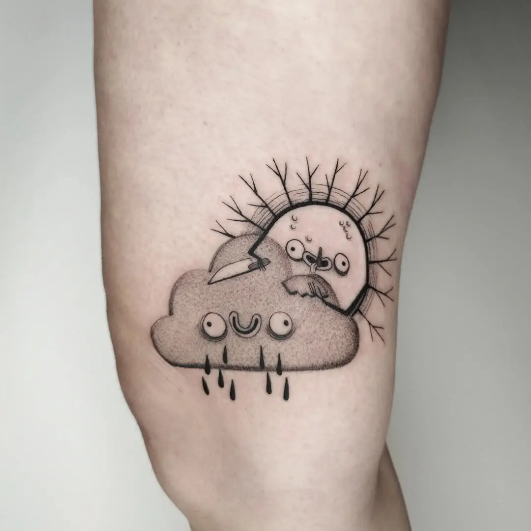 Adorable cloud tattoo with playful sun details