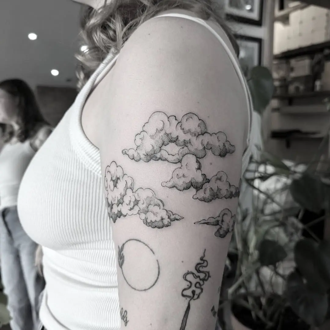 Stylish cloud tattoo perfect for arm placement