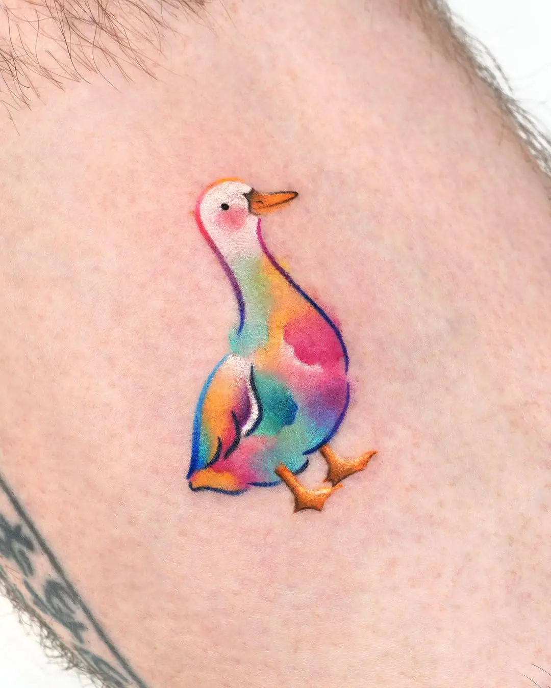 Whimsical duck tattoo in vibrant colors