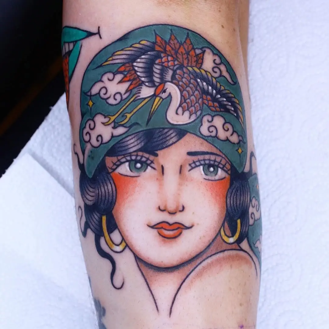 Elegant gypsy woman tattoo with vibrant colors