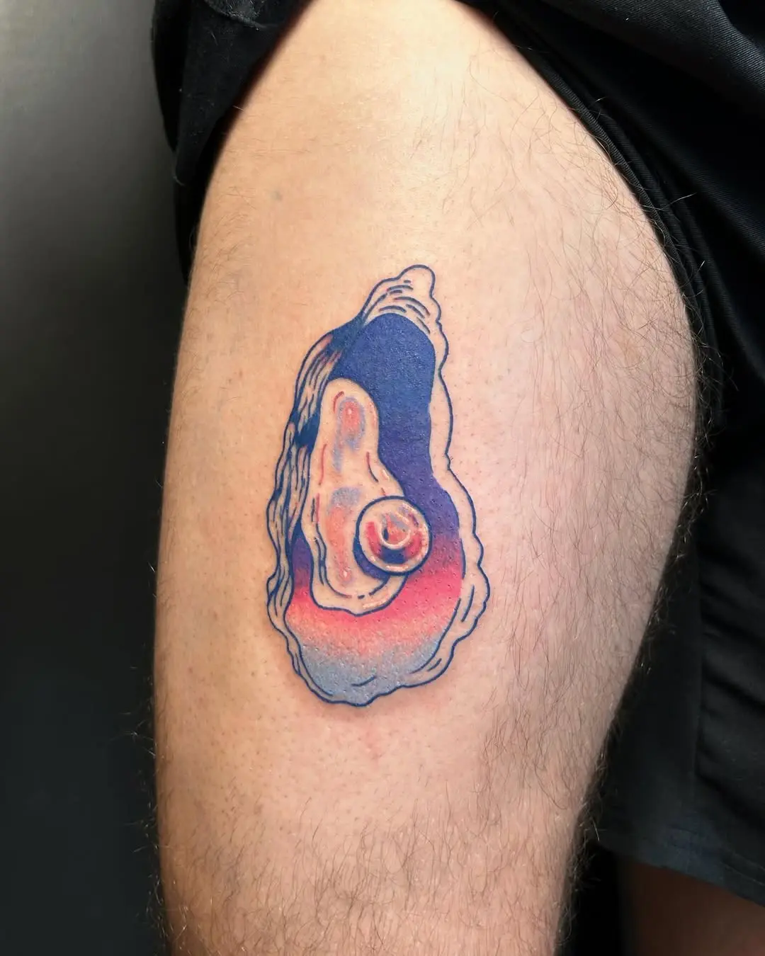 Vibrant Oyster Tattoo with Artistic Flair