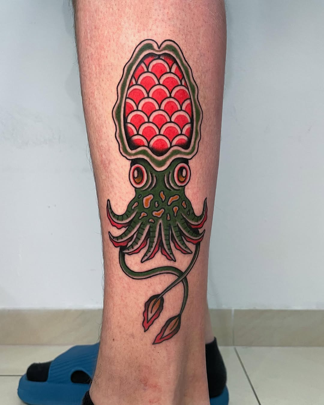 Vibrant squid tattoo with unique design elements