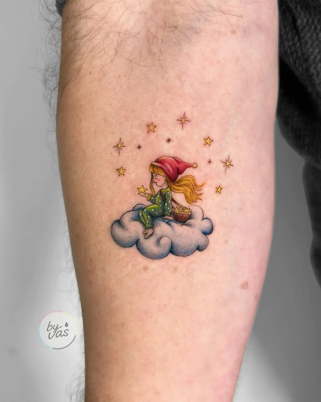 Charming cloud-themed tattoo with a whimsical vibe