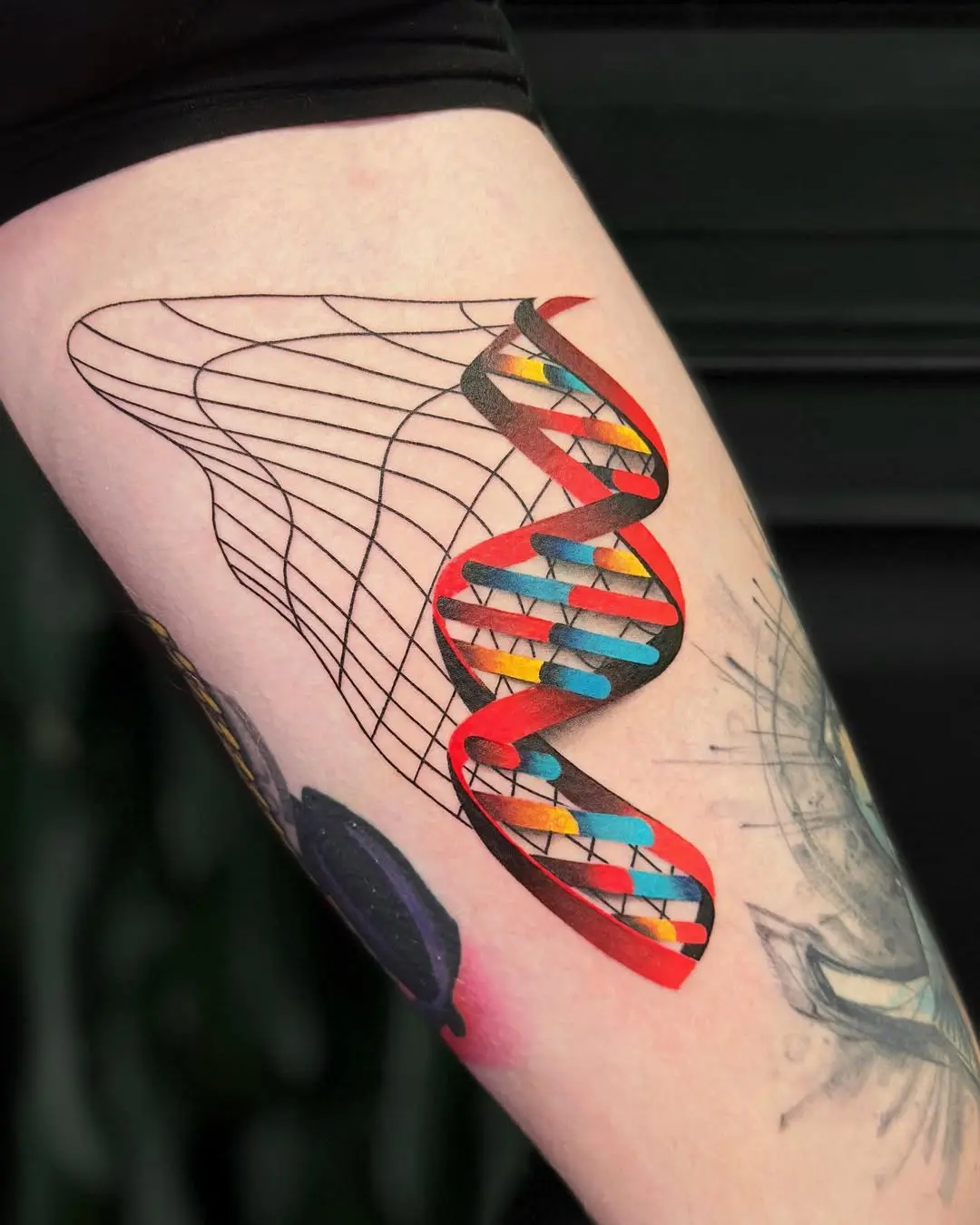 Vibrant DNA Tattoo with Artistic Flair