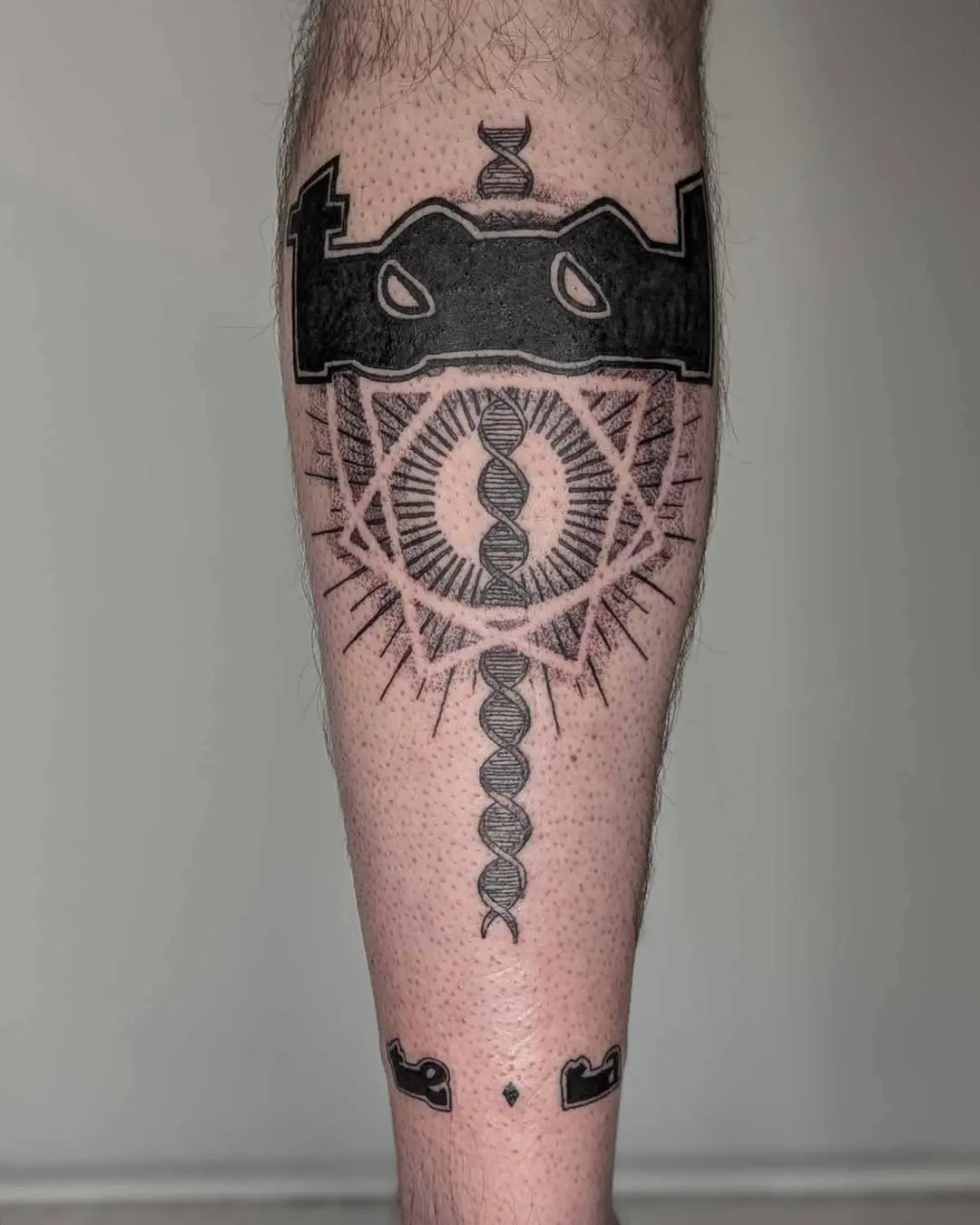 Intricate geometric DNA tattoo with bold symbolism