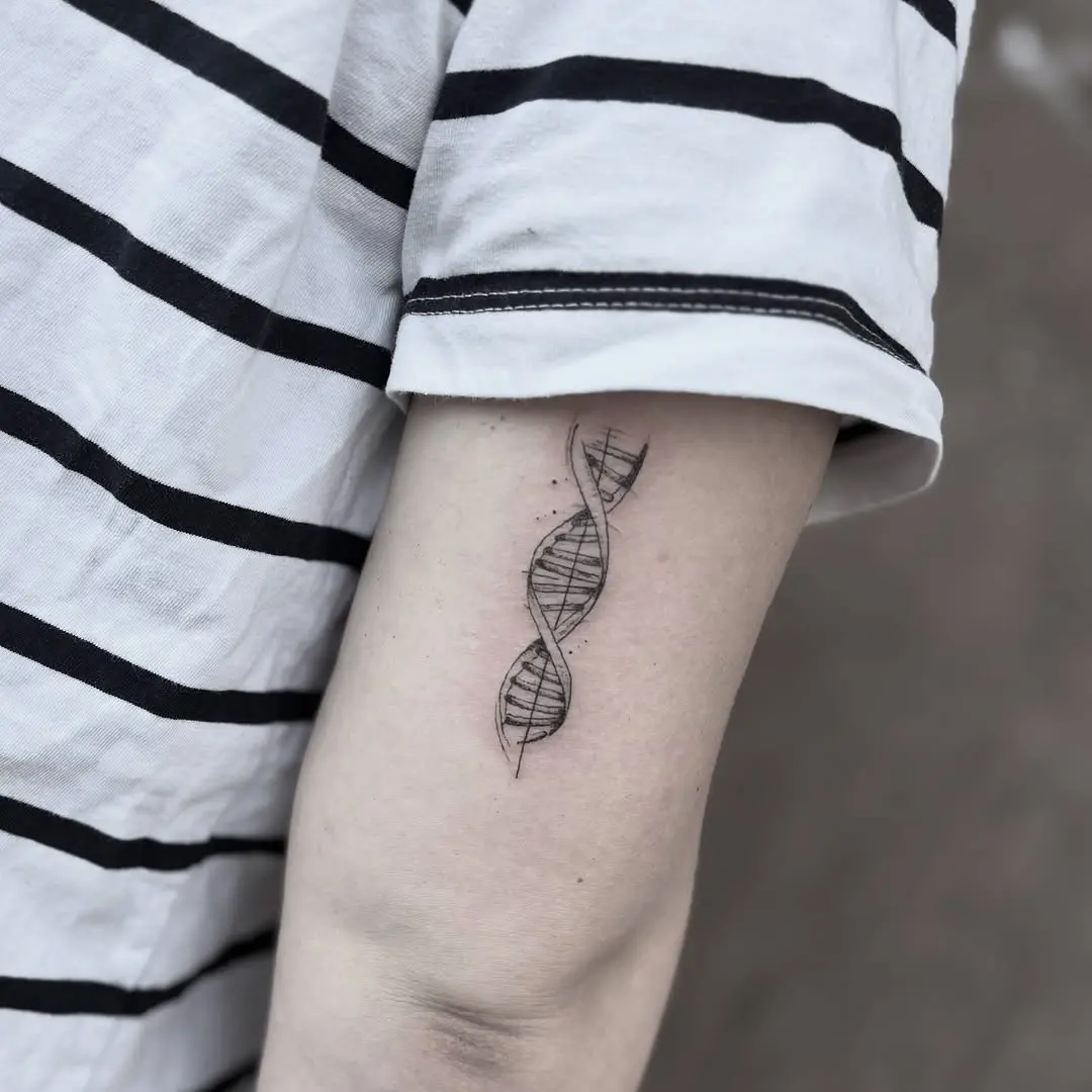 Stylish DNA tattoo design on forearm
