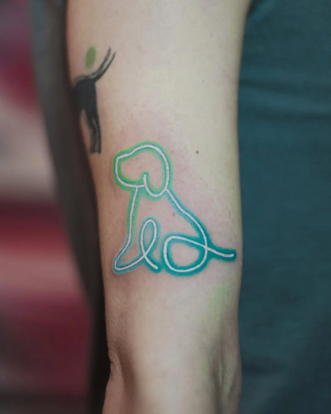 Playful neon dog tattoo design with lines